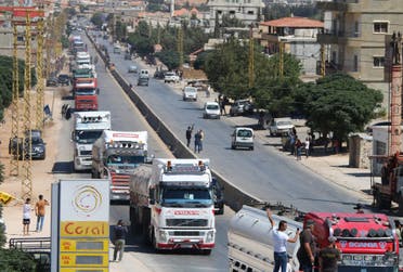 وصول ناقلات وقود إيراني من سوريا إلى العين بالهرمل شرق سهل البقاع اللبناني يوم 16 سبتمبر 2021 (فرانس برس)