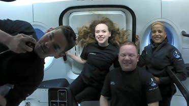 Inspiration4 crew Jared Isaacman, Sian Proctor, Hayley Arceneaux, and Chris Sembroski, seen on their first day in space in this handout photo released on September 17, 2021. (Reuters)