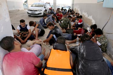 مهاجرون معتقلون في ليبيا (أرشيفية- أسوشييتد برس)