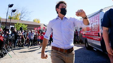 Canada's Liberal Prime Minister Justin Trudeau greets supporters during an election campaign stop in Richmond Hill, Ontario Canada September 18, 2021. (Reuters)