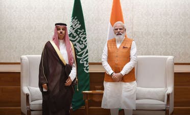 Saudi Arabia's Prince Faisal bin Farhan and India's Narendra Modi. (MoFA)