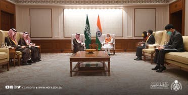 Saudi Arabia's Prince Faisal bin Farhan and India's Narendra Modi. (MoFA)