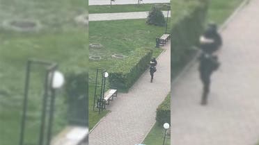 A student gunman who opened fire at a university in the Russian city of Perm is seen from a window. (Twitter)