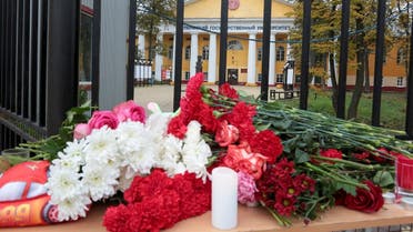 A view shows a makeshift memorial for victims of a deadly shooting at Perm State University in Perm, Russia September 21, 2021. (Reuters/Stringer)