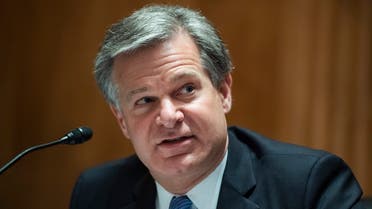 FBI Director Christopher Wray, testifies during a Senate Homeland Security and Governmental Affairs Committee hearing on Threats to the Homeland Thursday, Sept. 24, 2020 on Capitol Hill in Washington. (Tom Williams/Pool via AP)
