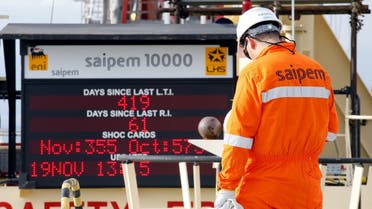 A staff member is seen on the Saipem 10000 deepwater drillship in Genoa's harbour, Italy, November 19, 2015. Picture taken November 19, 2015. (Reuters)