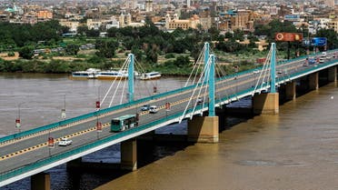 This picture taken on September 21, 2021 shows a view of the Mek Nimr Bridge across the Blue Nile river, linking the centre of Sudan's capital Khartoum with the adjacent city of Khartoum North (background). (AFP)