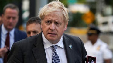 British Prime Minister Boris Johnson walks outside United Nations headquarters during the 76th Session of the U.N. General Assembly, in New York, US, September 20, 2021. (Reuters)