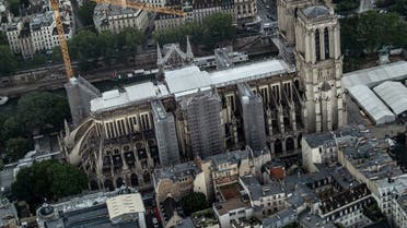 An aerial picture taken on July 12, 2021 shows a view of the Notre-Dame de Paris Cathedral on the “Ile de la Cite” island in the Seine river in Paris. (Bertrand Guay/AFP)