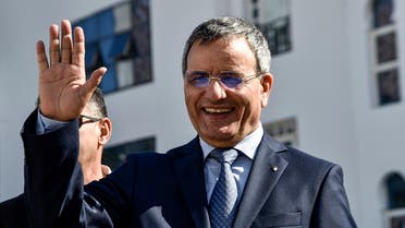 Ali Ghediri waves as he arrives to submit his candidacy before the constitutional council, March 3, 2019. (AFP)