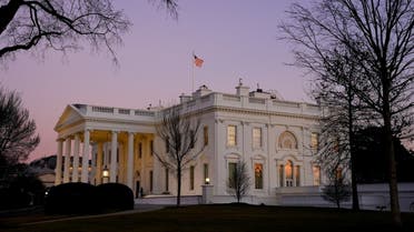 The White House is seen at sunset on US President Joe Biden's first day in office, Jan. 20, 2021. (Reuters)