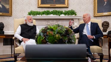 President Joe Biden (R) gestures to Indian PM Narendra Modi during a bilateral meeting at the White House Sept. 24, 2021. (AFP)