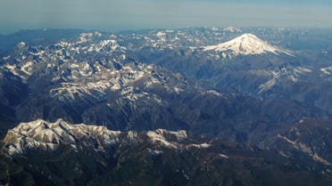 (FILES) This file photo taken on October 09, 2020, shows an aerial view of the Caucasus mountains in Russia with Mount Elbrus (5642 m) in the background. Five climbers died after a blizzard on Mount Elbrus, Europe's highest peak, Russia's emergencies ministry said on September 24, 2021. (File photo: AFP)