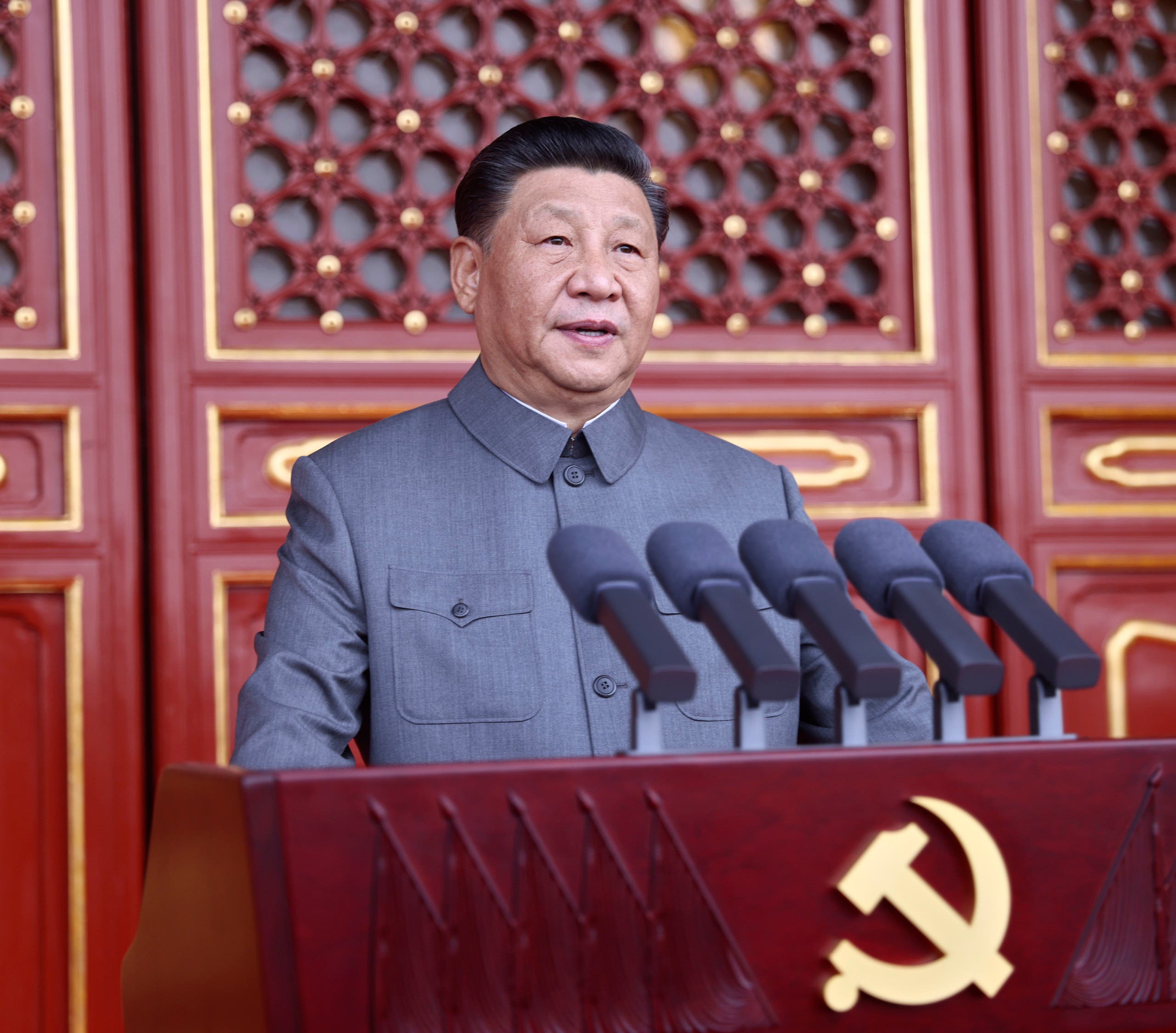 In this photo provided by China's Xinhua News Agency, Chinese President and party leader Xi Jinping delivers a speech at a ceremony marking the centenary of the ruling Communist Party in Beijing, China, Thursday, July 1, 2021. China's Communist Party is marking the 100th anniversary of its founding with speeches and grand displays intended to showcase economic progress and social stability to justify its iron grip on political power that it shows no intention of relaxing. (Ju Peng/Xinhua via AP)