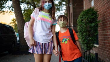 Special needs children Gianna Tesoriero, 11 and Roberto Tesoriero, 7, pose for a portrait in Brooklyn, New York, U.S., September 20, 2021. Picture taken September 20, 2021. REUTERS/Hannah Beier
