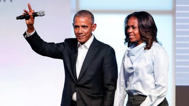 Former US President Barack Obama and former first lady Michelle Obama greet guests during the first day of the Obama Foundation Summit in Chicago, Illinois, US, on October 31, 2017. (Reuters)