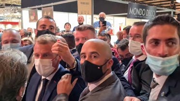 Macron egged by protester shouting 'Vive la Revolution'