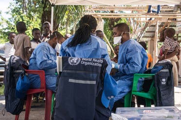 فريق من منظمة الصحة خلال حملة مكافحة ايبولا في الكونغو الديمقراطية في 2018 (أرشيفية)