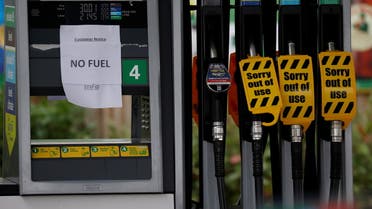 A 'No Fuel' sign is attached to an empty petrol pump at a BP filling station in Manchester, Britain, September 28, 2021. (Reuters)
