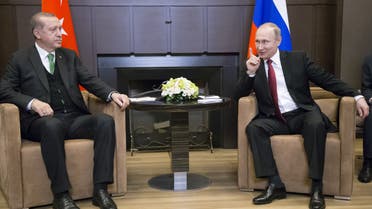 FILE PHOTO: Russian President Vladimir Putin (R) meets with his Turkish counterpart Tayyip Erdogan in Sochi, Russia, May 3, 2017. REUTERS/Alexander Zemlianichenko/Pool/File Photo