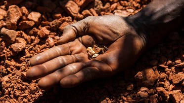 An artisan miner displays raw gold nuggets at an excavation site in Namorinyang, Eastern Equatoria, South Sudan. (File Photo: Reuters)