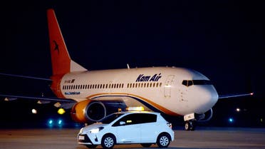 A Boeing 737-31S Kam Air passenger plane with people evacuated from Afghanistan on board, lands at Boryspil International Airport outside Kiev, on August 23, 2021.