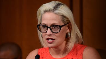 Senator Kyrsten Sinema (D-AZ) questions David Marcus, head of Facebook's Calibra (digital wallet service), during testimony before a Senate Banking, Housing and Urban Affairs Committee hearing on Examining Facebook's Proposed Digital Currency and Data Privacy Considerations on Capitol Hill in Washington, U.S., July 16, 2019. REUTERS/Erin Scott