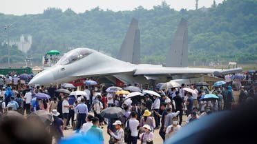 Visitors look at a J-16D electronic warfare aircraft displayed at the China International Aviation and Aerospace Exhibition, or Airshow China, in Zhuhai, Guangdong province, China September 28, 2021. (Reuters)