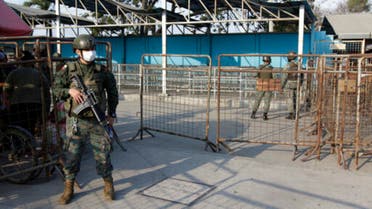 Soldiers guard the entrance to the Litoral Penitentiary a day after a deadly riot, in Guayaquil, Ecuador, Wednesday, September 29, 2021. (AP)