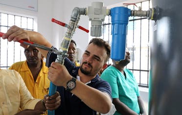 Batuhan Yucel, a Turkish technician, installs the public oxygen plant amid the coronavirus disease (COVID-19) pandemic at the Banadir Hospital in Mogadishu, Somalia September 28, 2021. (Reuters/Feisal Omar)