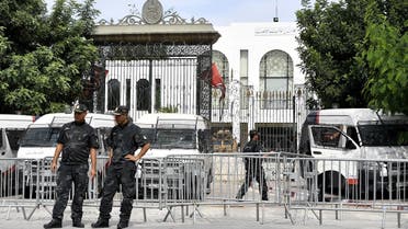 Tunisian security forces guard the entrance of the country's parliament, on October 10, 2021. (Fethi Belaid/AFP)