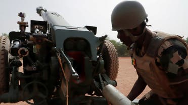 A Malian soldier of the 614th Artillery Battery is pictured during a training session on a D-30 howitzer with the European Union Training Mission (EUTM), to fight extremists, in the camp of Sevare, Mopti region, in Mali on March 23, 2021. (Reuters)