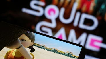The Netflix series Squid Game is played on a mobile phone in this picture illustration taken September 30, 2021. REUTERS/Kim Hong-Ji/Illustration