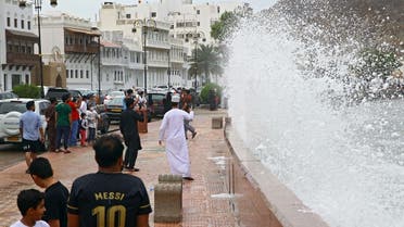 High waves break on the sea side promenade in the Omani capital Muscat on October 2, 2021, as the Shaheen tropical storm hits the country. (AFP)
