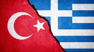 Greece and Turkey two flags together textile cloth fabric texture stock photo