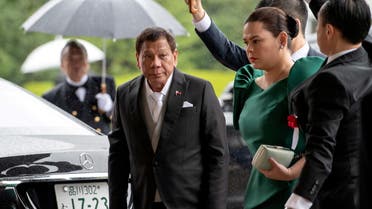 FILE PHOTO: Philippines President Rodrigo Duterte arrives with daughter and first lady Sara Duterte-Carpio to attend the enthronement ceremony of Japan's Emperor Naruhito in Tokyo, Japan October 22, 2019. Carl Court/Pool via REUTERS/File Photo
