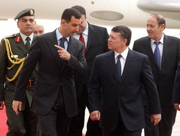 Syria's President Bashar al-Assad speaks to Jordan's King Abdullah (front R) at Amman airport March 20, 2009. (File photo: Reuters)
