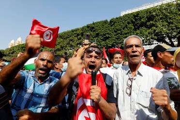 Supporters of Tunisian President Kais Saied rally in support of his seizure of power and suspension of parliament, in Tunis, Tunisia, October 3, 2021. REUTERS/Zoubeir Souissi