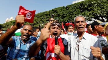 Supporters of Tunisian President Kais Saied rally in support of his seizure of power and suspension of parliament, in Tunis, Tunisia, Oct. 3, 2021. (Reuters)