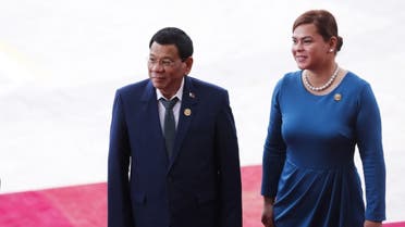 Philippine President Rodrigo Duterte (L) and his daughter Sara Duterte arrive for the opening of the Boao Forum for Asia (BFA) Annual Conference 2018 in Boao, south China's Hainan province on April 10, 2018. (AFP)