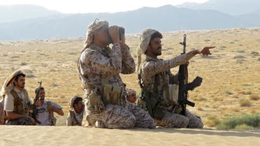 Fighters loyal to Yemen's government are pictured on the frontline facing Iran-backed Houthis in the country's northeastern province of Marib on September 27, 2021. (AFP)