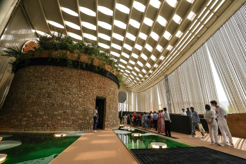 People visit the Italian pavilion at the Expo 2020, in the Gulf Emirate of Dubai, on October 1, 2021. (AFP)