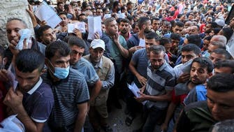 Thousands of Palestinians in Gaza apply for Israeli work permits
