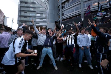 Newcastle United Takeover - St James' Park, Newcastle, Britain - October 7, 2021 Fans react outside the stadium after Newcastle United announced takeover. (Reuters)