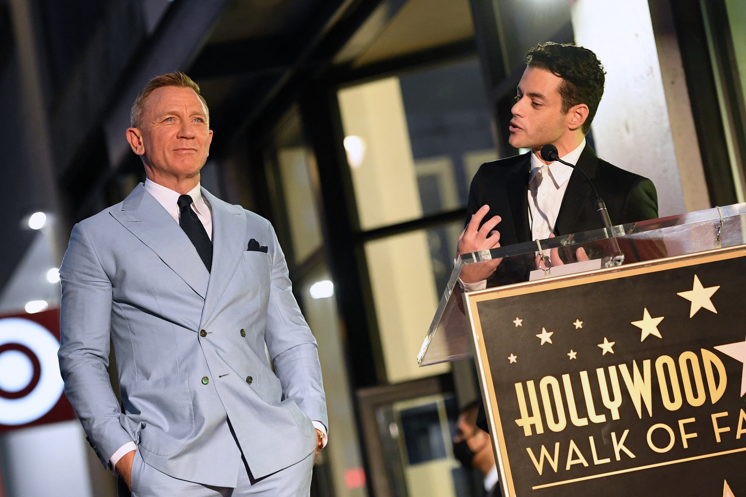 US actor Rami Malek (R) speaks during the ceremony to honor British actor Daniel Craig with a star on the Hollywood Walk of Fame in Los Angeles, California, on October 6, 2021. Craig's star will be located at 7007 Hollywood Boulevard, chosen for Craig's portrayal of James Bond in '007' films. (AFP)