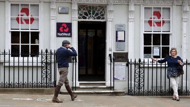 Customers use a NatWest bank on the High Street in Winchester, south west England on March 31, 2021. (File photo: AFP)