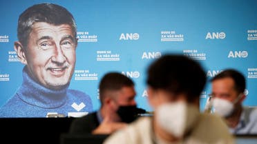 A billboard of Czech Prime Minister and leader of ANO party, Andrej Babis, is seen as journalists wait ahead of a news conference in Prague, Czech Republic October 9, 2021. (Reuters)