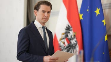 Austrian Chancellor Sebastian Kurz arrives to give a press statement on the government crisis at the Federal Chancellery in Vienna, Austria, on October 9, 2021. (AFP)
