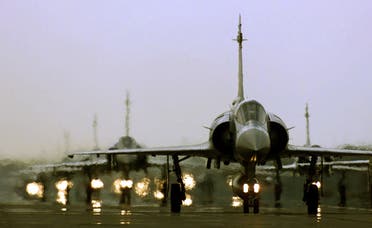 Mirage fighter jets taxi on the runway at a northern Taiwan air force base in Hsinchu. (Reuters)