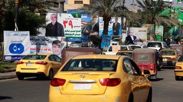 من أحد شوارع بغداد حيث تنتشر صور المرشحين للانتخابات النيابية (أرشيفية- فرانس برس)